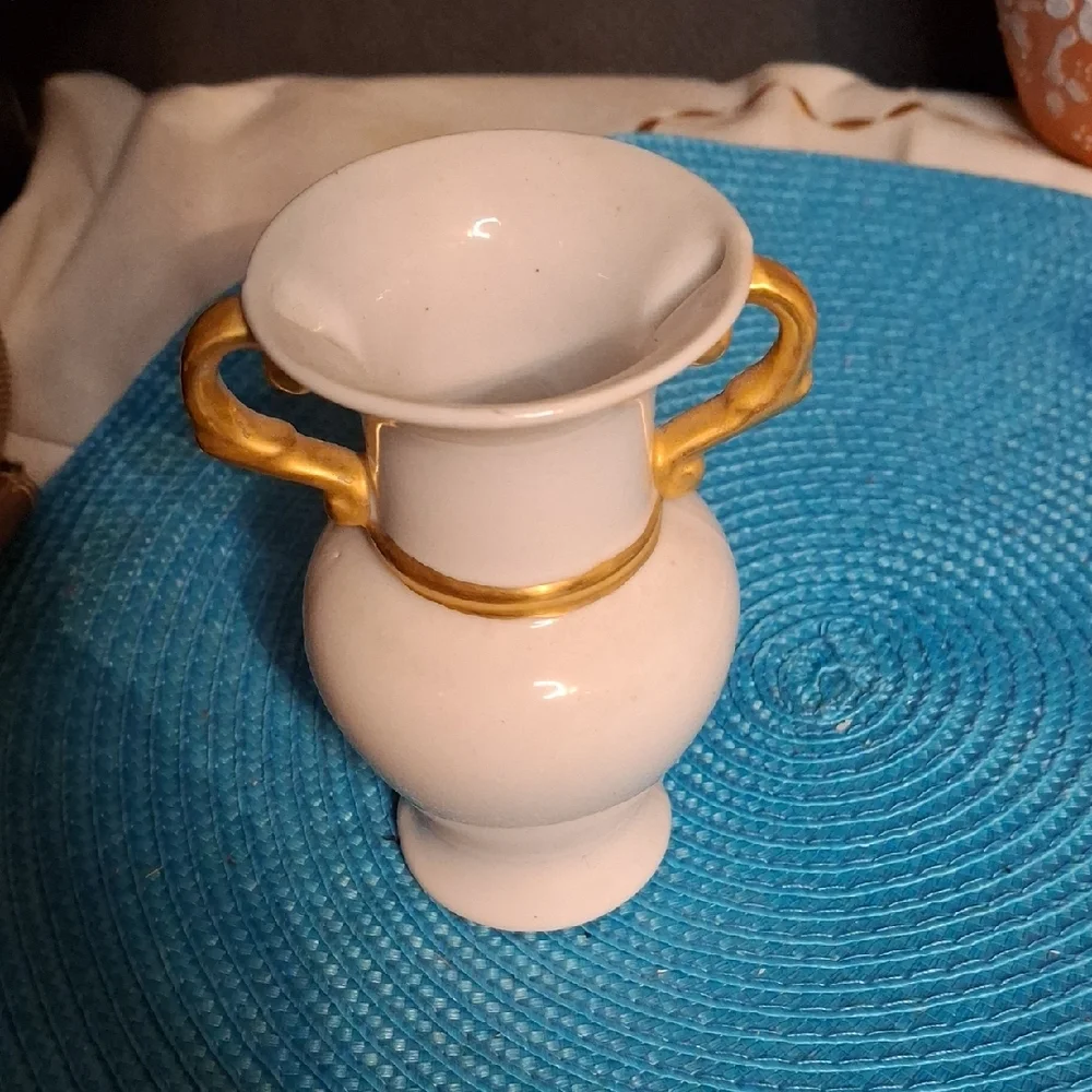 Elegant White Vase with Gold Accents